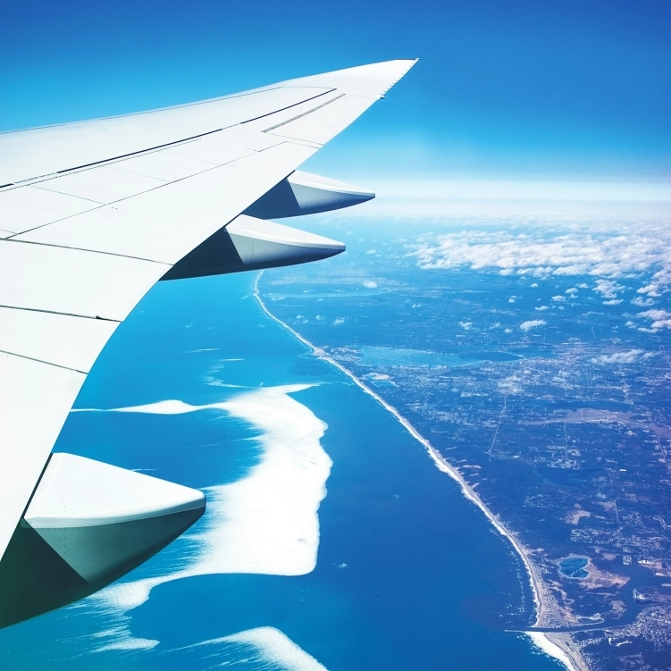 Plane flying over a city